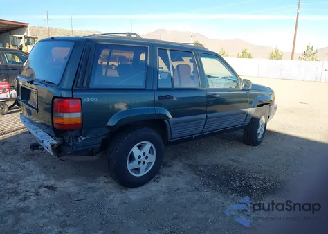 1994 Jeep Grand Cherokee Laredo z USA, uszkodzony, nr VIN 1J4GZ58S3RC283992